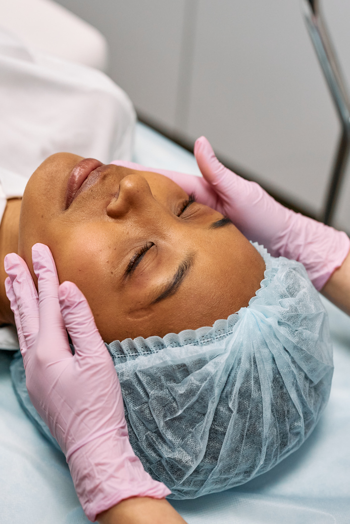 A Woman having Facial Care